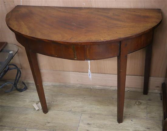 A George III mahogany D shaped side table W.100cm